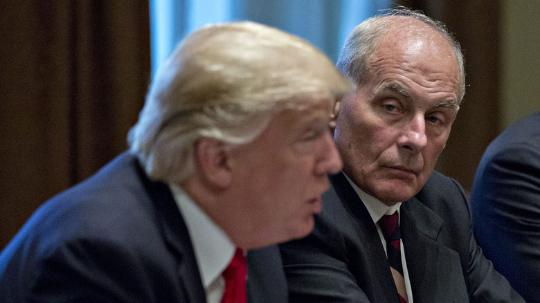 John Kelly looks at Donald Trump