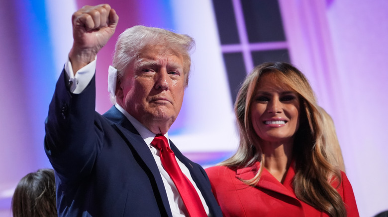 Donald Trump, Melania Trump standing