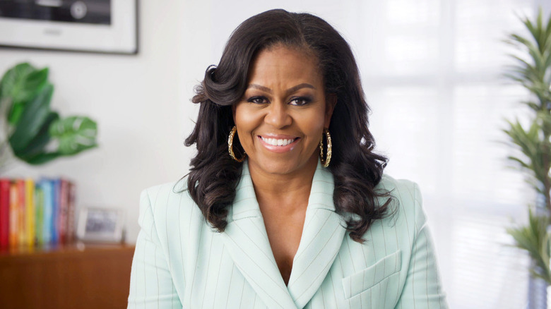 Michelle Obama gold earrings sea foam blazer