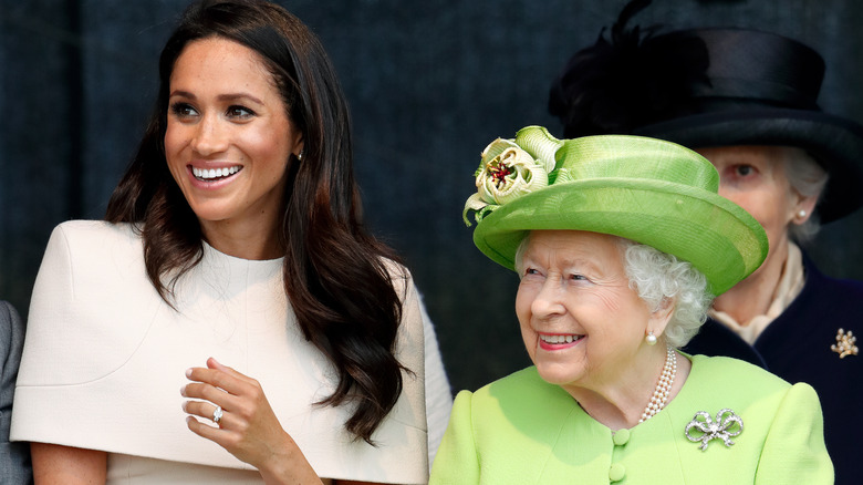 Meghan Markle and Queen Elizabeth smiling