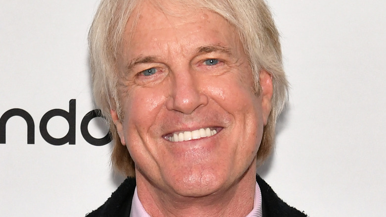 John Tesh with wide smile