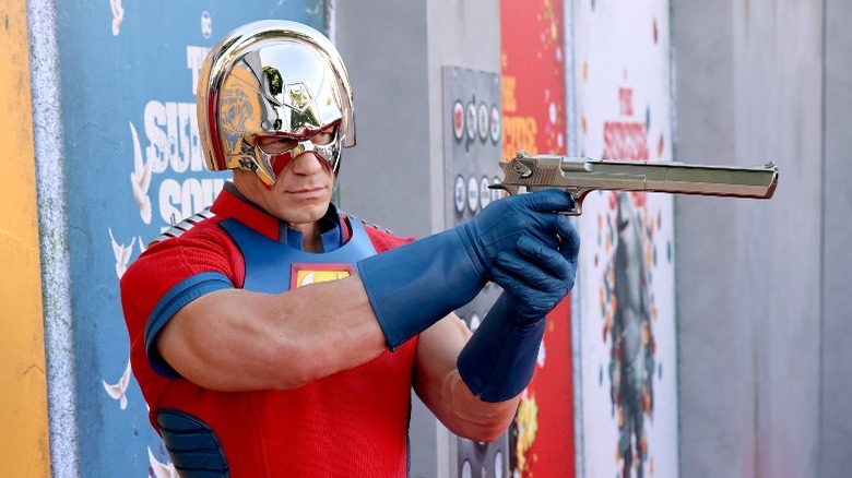 John Cena dressed as the Peacemaker at movie premiere 