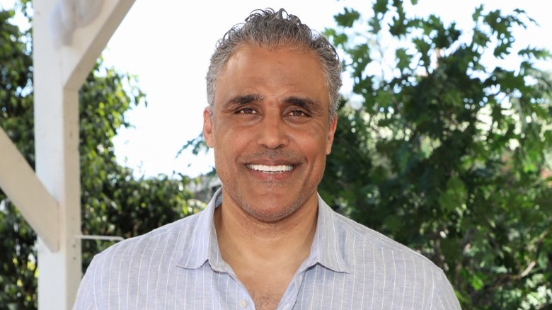 Rick Fox smiling in an outdoor setting