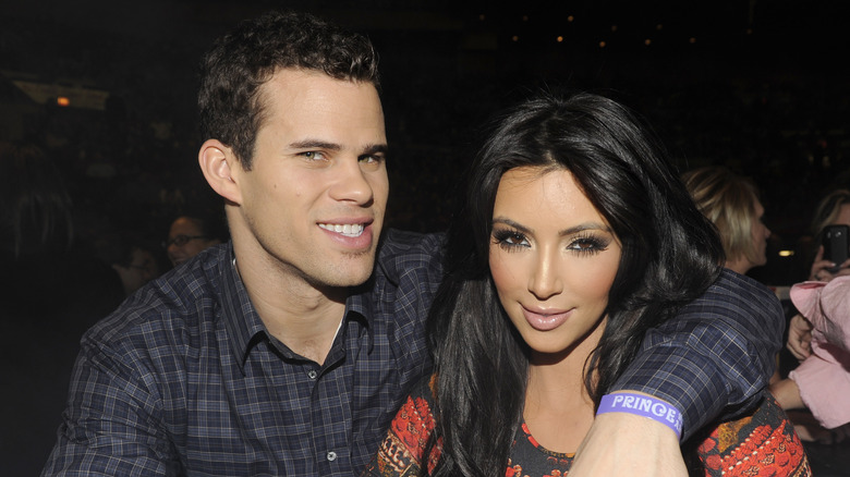 Kim Kardashian and Kris Humphries pose together at a Prince event