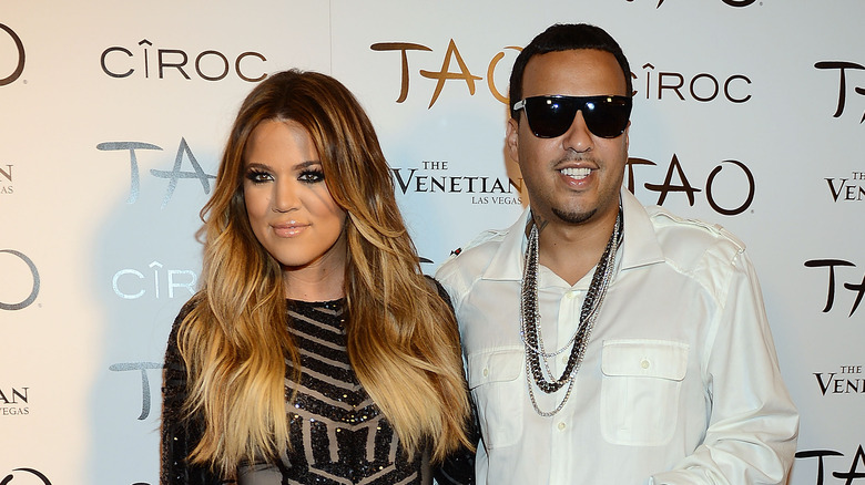 Khloe Kardashian and French Montana pose together at TAO nightclub