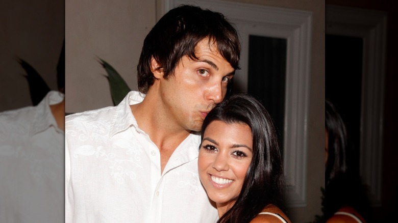 Kourtney Kardashian poses with Joe Francis