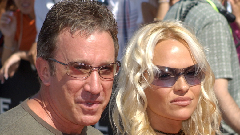 Tim Allen posing with Pamela Anderson