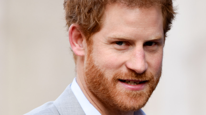 Prince Harry frowning