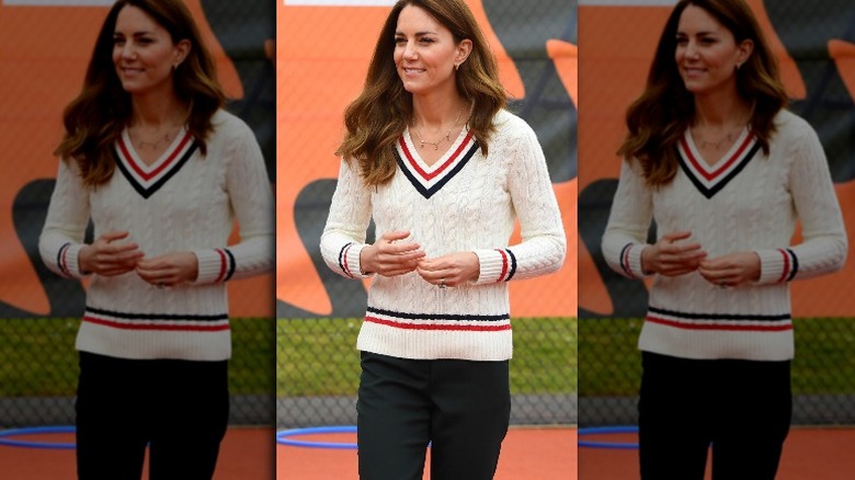 Kate Middleton smiling on tennis court