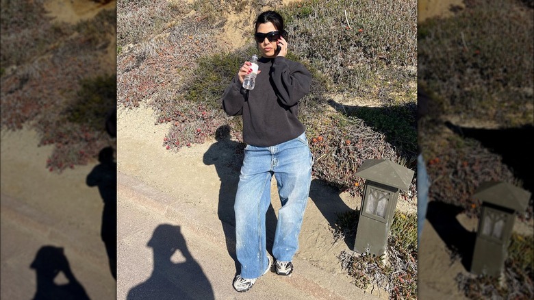 Kourtney Kardashian wearing oversized sweatshirt