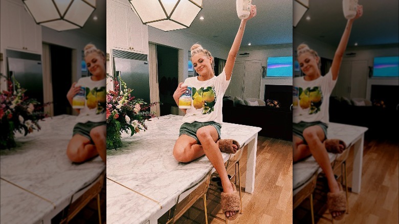 Kelsea Ballerini posing for photo at home