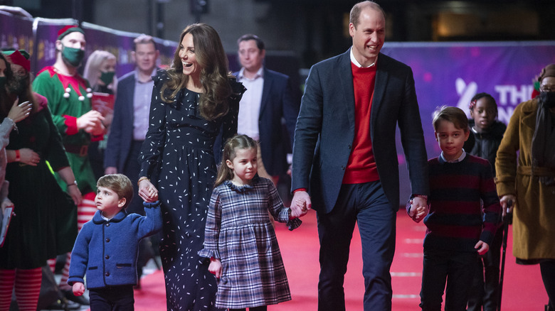 Prince Louis, Kate Middleton, Princess Charlotte, Prince William, Prince George walking