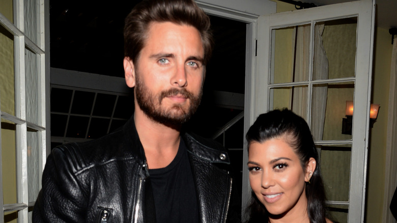 Scott Disick and Kourtney Kardashian posing in 2015