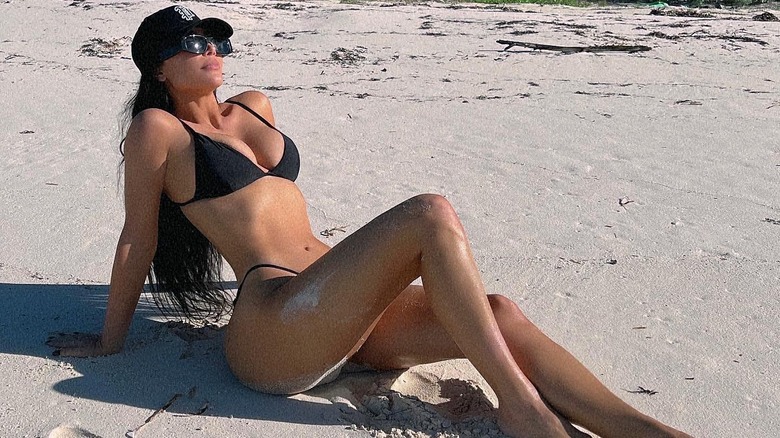 Kim Kardashian posing on the beach