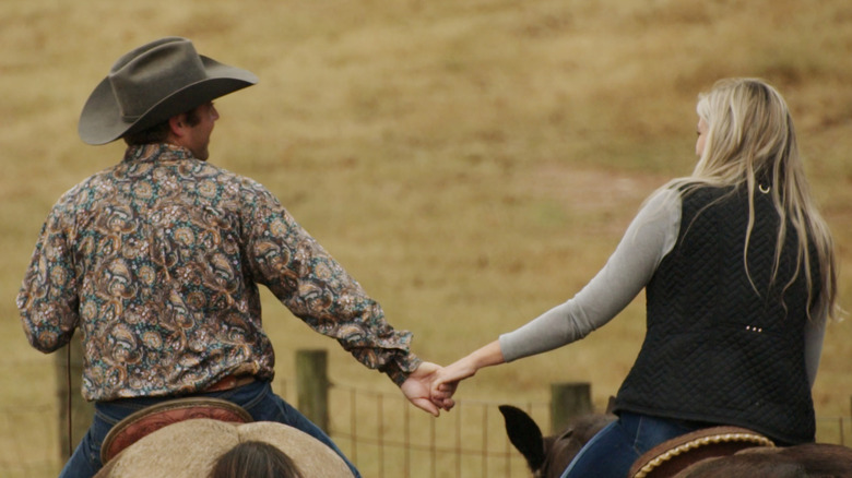 Farmer Hunter and Meghan riding horses