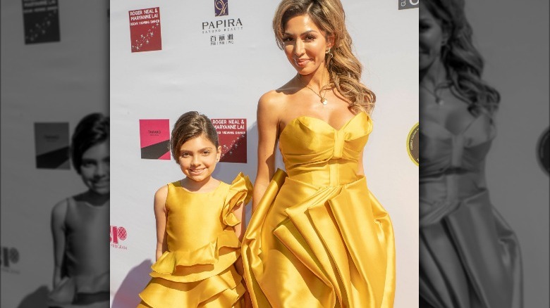 Sophia Laurent Abraham and Farrah Abraham wearing golden dresses