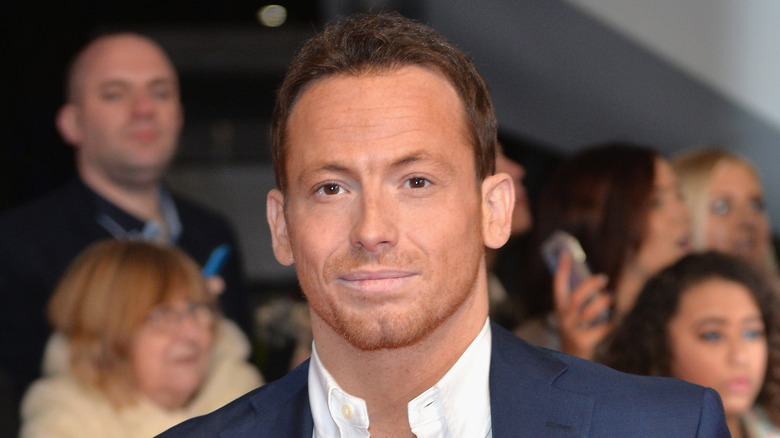 Joe Swash posing