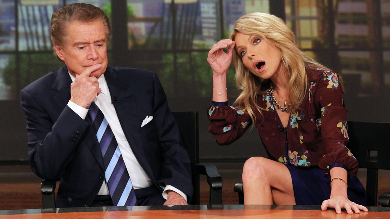 Regis Philbin and Kelly Ripa pulling faces