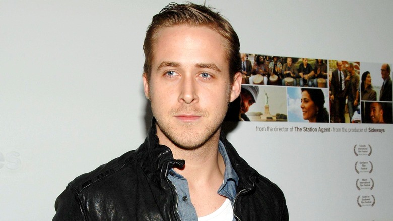 Ryan Gosling with a small smile