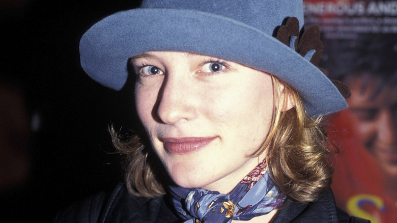 Cate Blanchett wearing a hat, posing