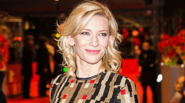 Cate Blanchett smiling on a red carpet