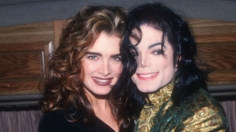 Brooke Shields and Michael Jackson, both smiling