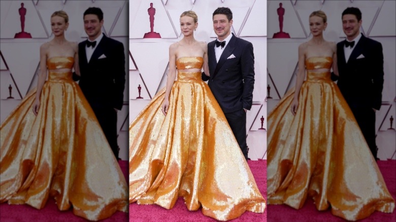 Carey Mulligan and Marcus Mumford posing at the 93rd Academy Awards