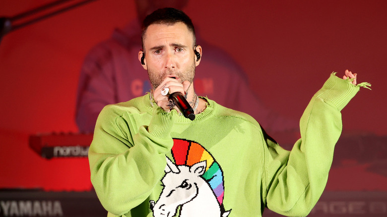 Adam Levine performing