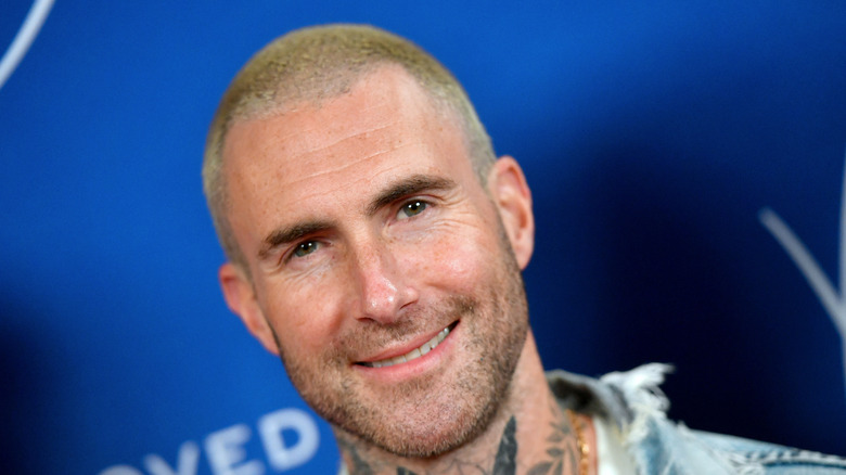 Adam Levine smiling