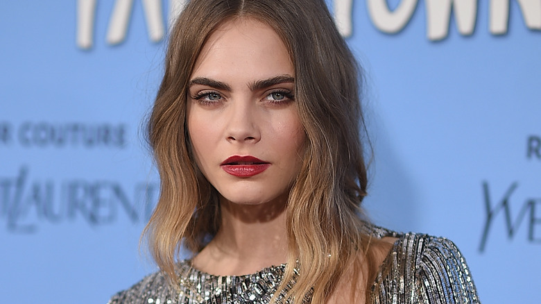 Cara Delevingne brooding red lipstick