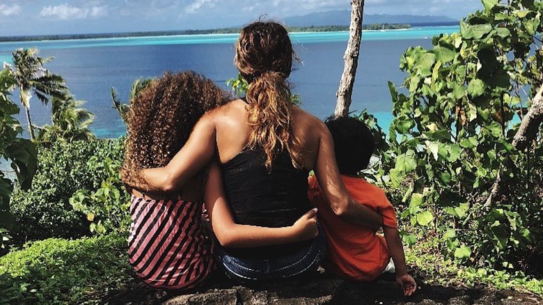 Halle Berry and kids, embracing from behind