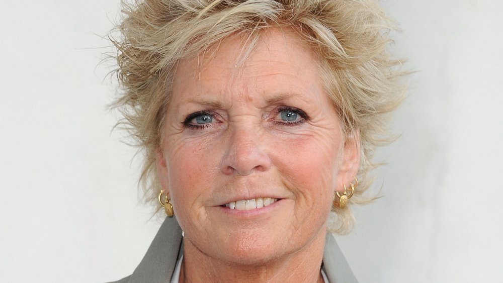 Meredith Baxter in a gray blazer, posing with a half-smile