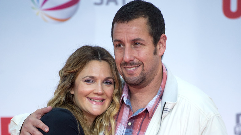 Drew Barrymore and Adam Sandler smiling