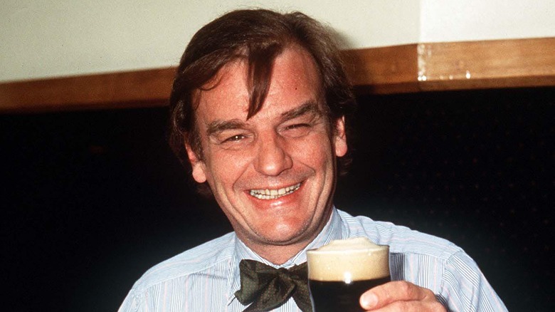 Keith Floyd holding a beer