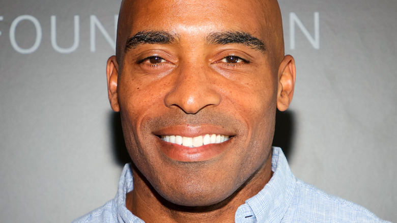 Tiki Barber wearing a blue shirt on the red carpet 