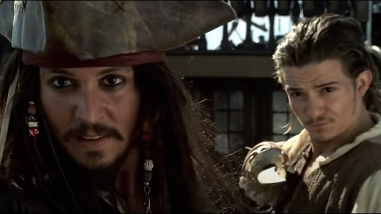 Johnny Depp with Orlando Bloom in "Pirates of the Caribbean"