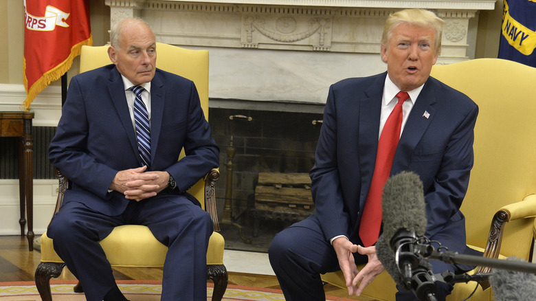 John Kelly looking at Donald Trump