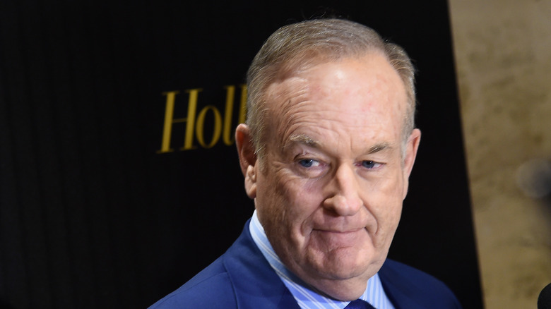 Bill O'Reilly blue suit smirking