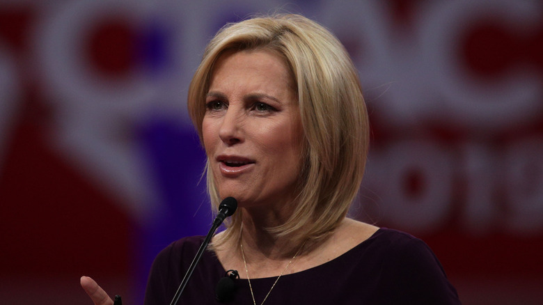 Laura Ingraham speaking into microphone