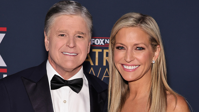 Sean Hannity and Ainsley Earhardt pose together with big smiles