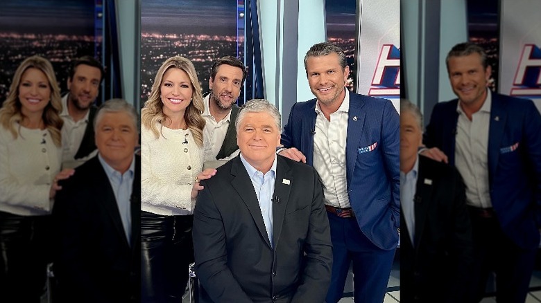 Ainsley Earhardt and Sean Hannity pose with other Fox colleagues