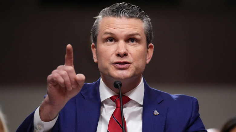 Pete Hegseth wearing a blue suit