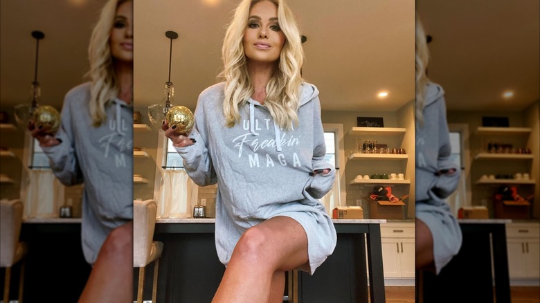 Tomi Lahren wearing a maga sweater