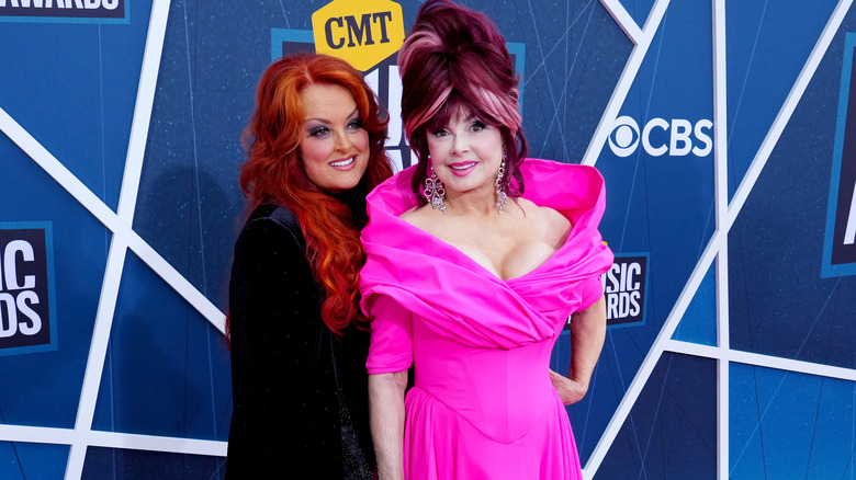 Naomi and Wynonna Judd pose 