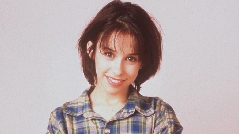 Lacey Chabert in a '90s button-down, short hair