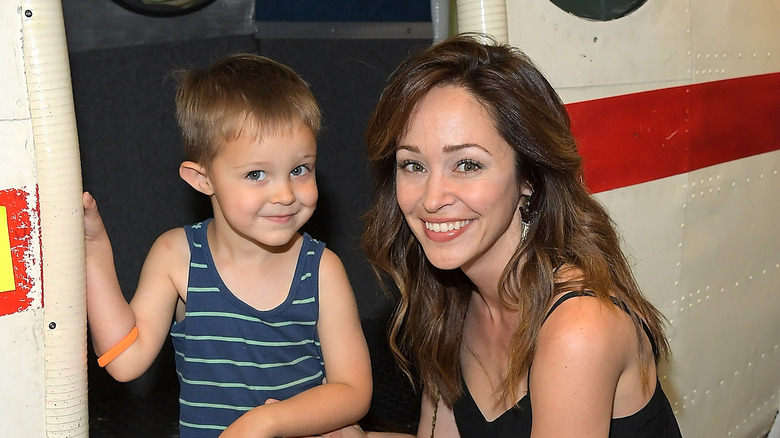 Autumn Reeser and her son, smiling