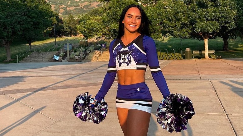 Gabi Butler holding pom-poms