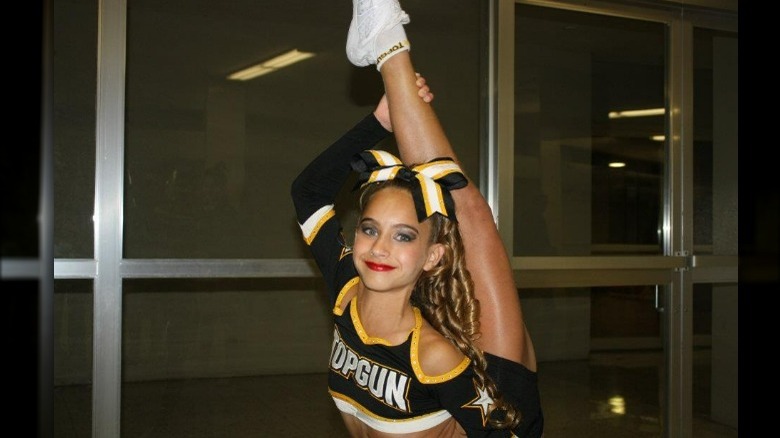 Gabi Butler stretching foot over head