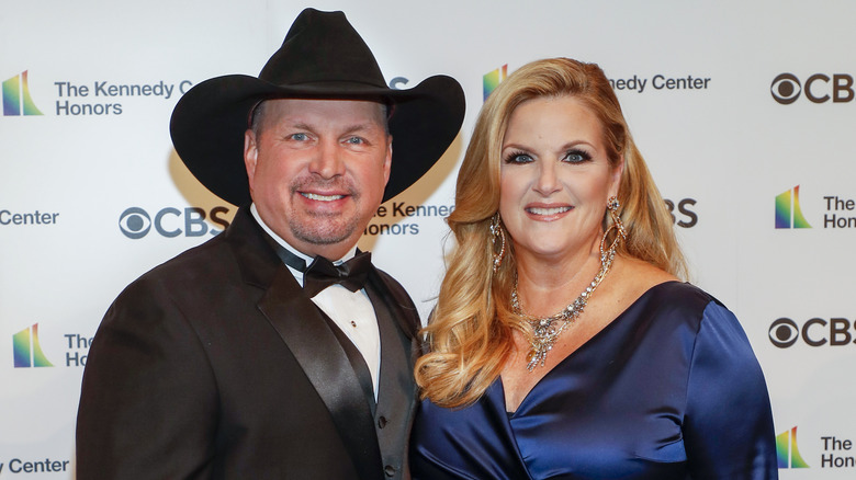 Garth Brooks and Trisha Yearwood smiling  