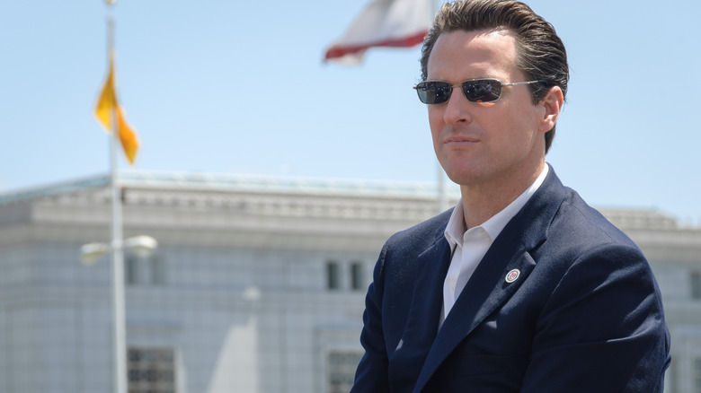 Gavin Newsom posing in sunglasses